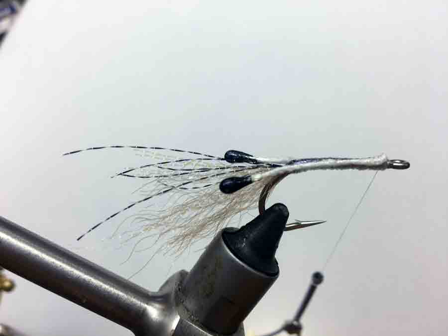 https://www.tailflyfishing.com/wp-content/uploads/2020/12/saltwater-fly-fishing-saltwater-flies-Step-02.jpg